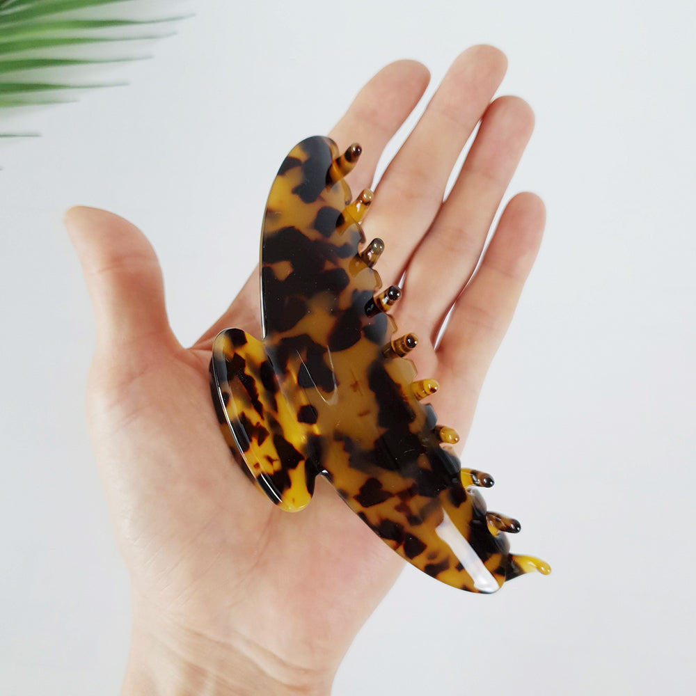 Half moon claw clip in hand for size
