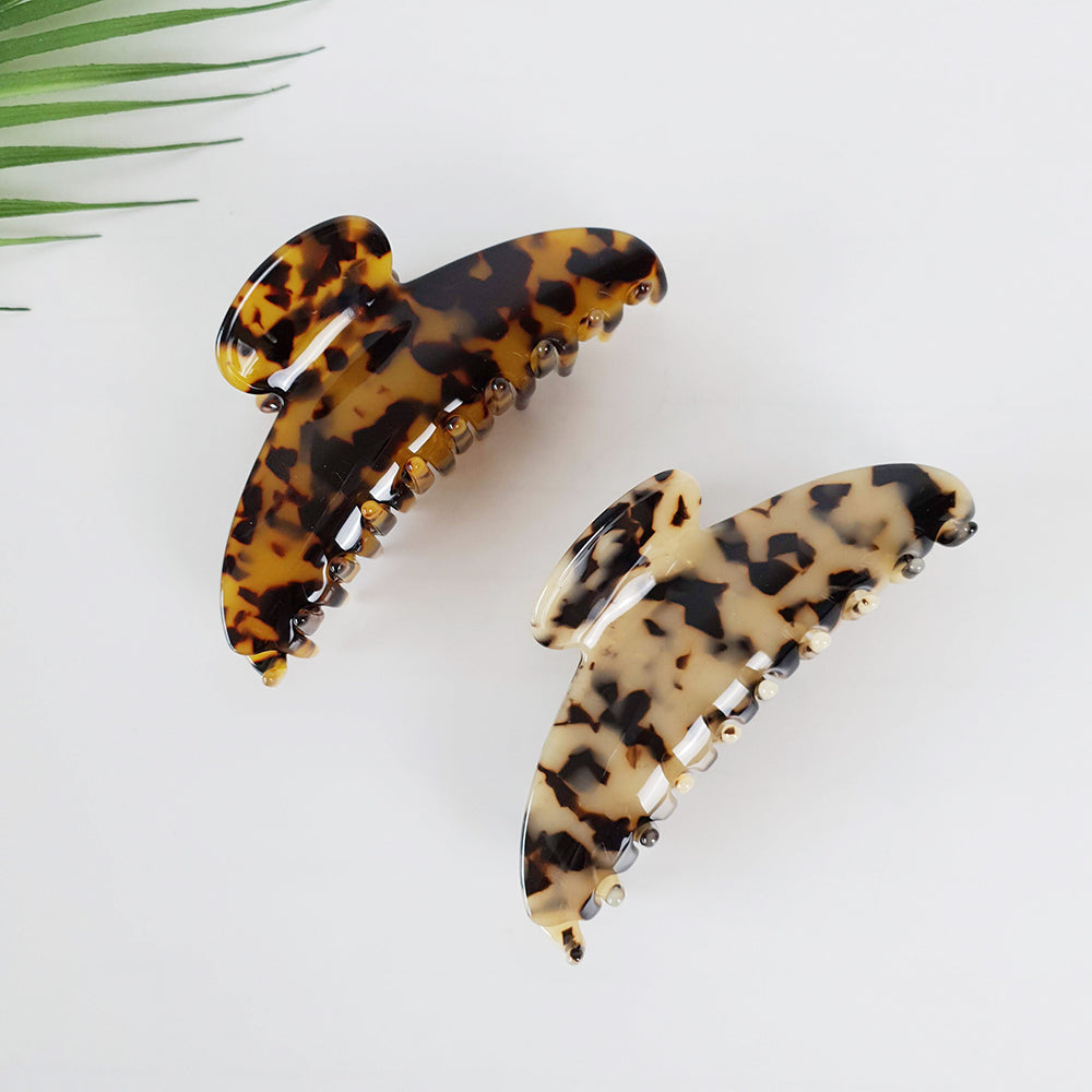Two half moon claw clips in tortoise acetate