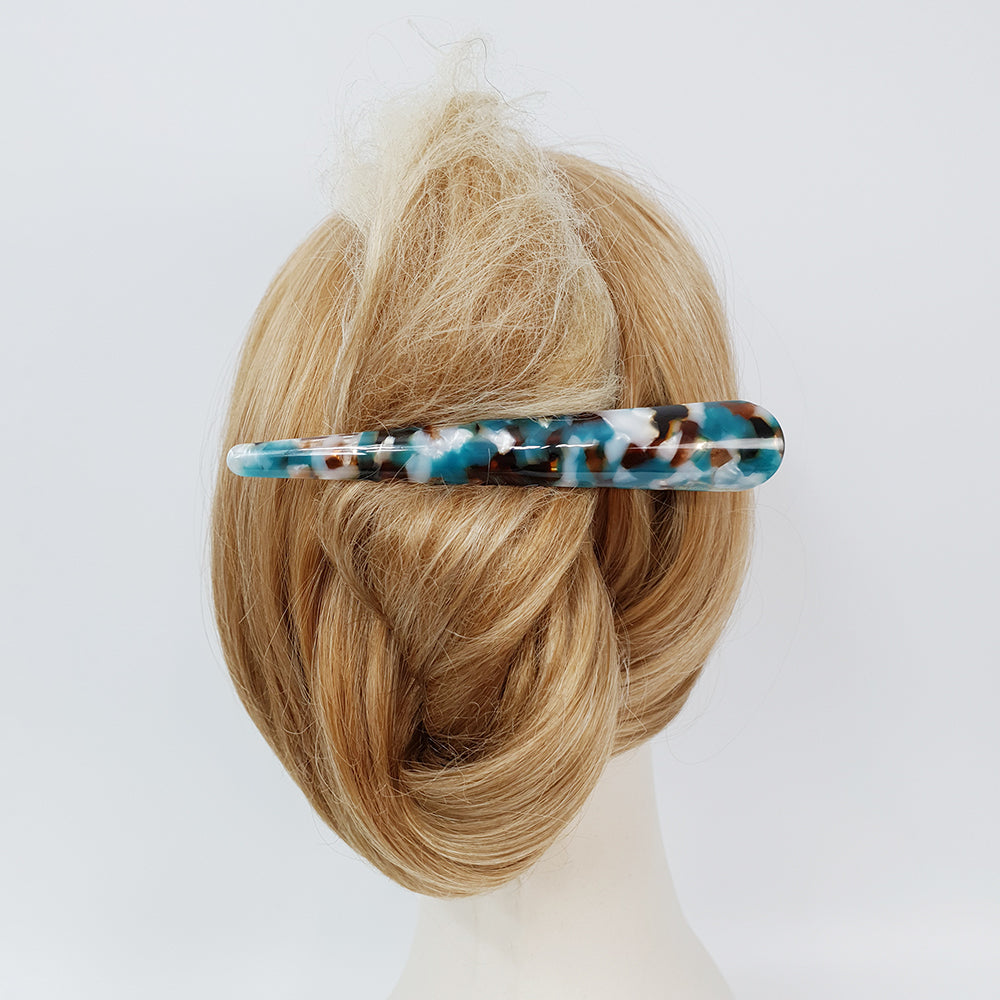 4 Art Blue Green alligator clip in an updo on a mannequin