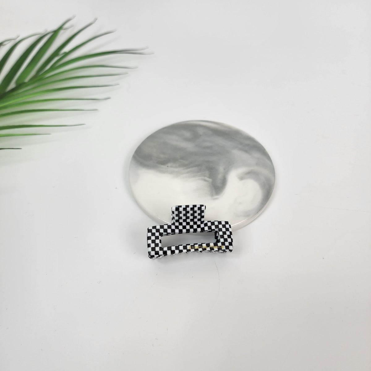 Mini square hair claw clip in 46 Mosaic Black, small black and white check pattern
