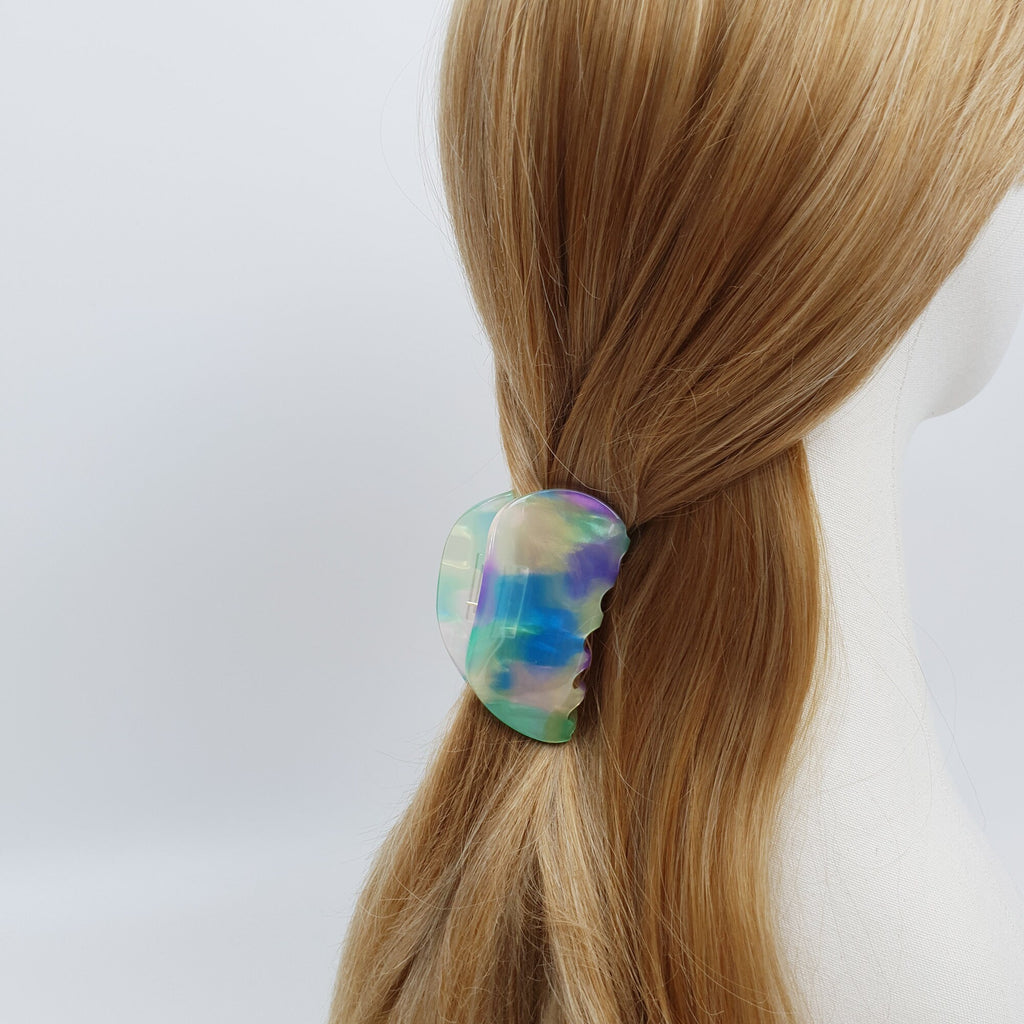 Medium pebble shaped cellulose acetate hair claw clip in tortoise shell and aurora patterns. 3 inch jaw clip for half-up hairstyles.