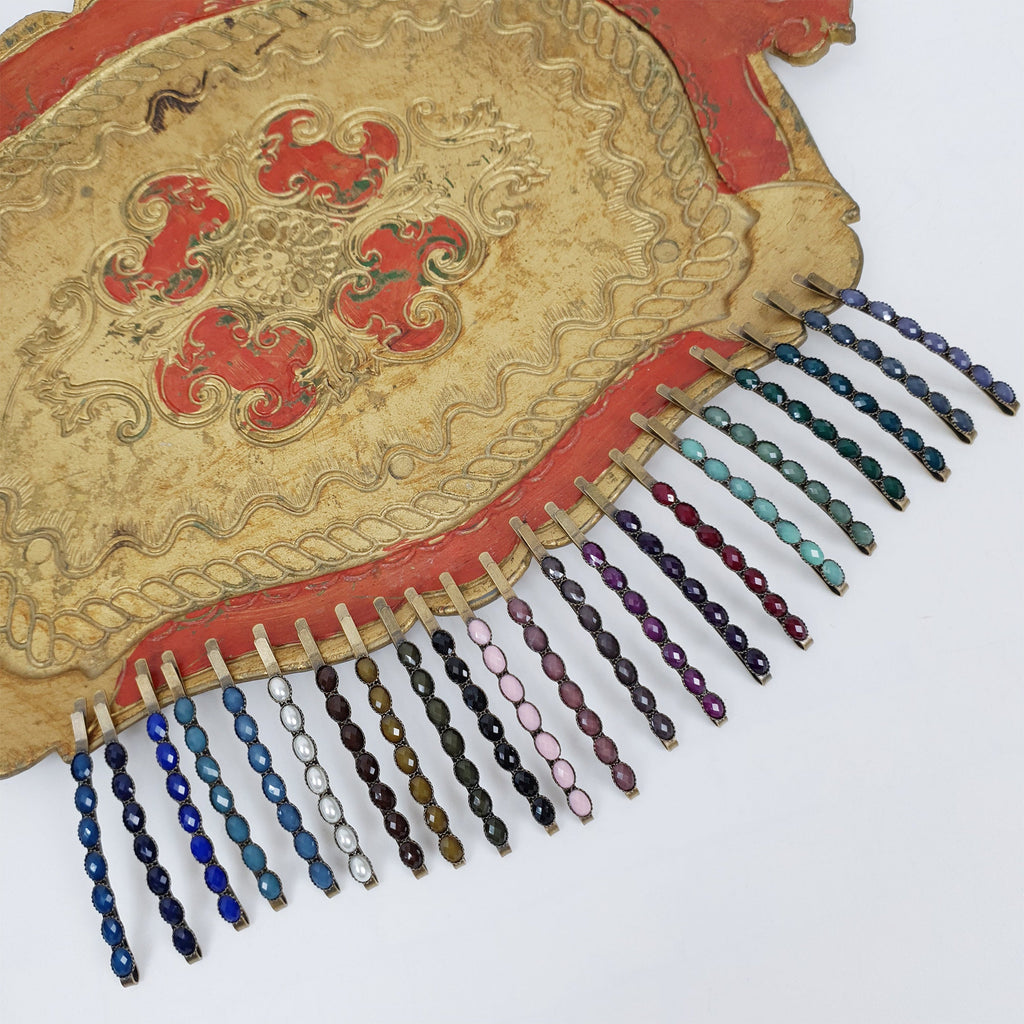 Gold tone brass bobby pin with row of small faceted beads. Vintage antique style hair slide for side bangs, cute minimalist hair accessory.