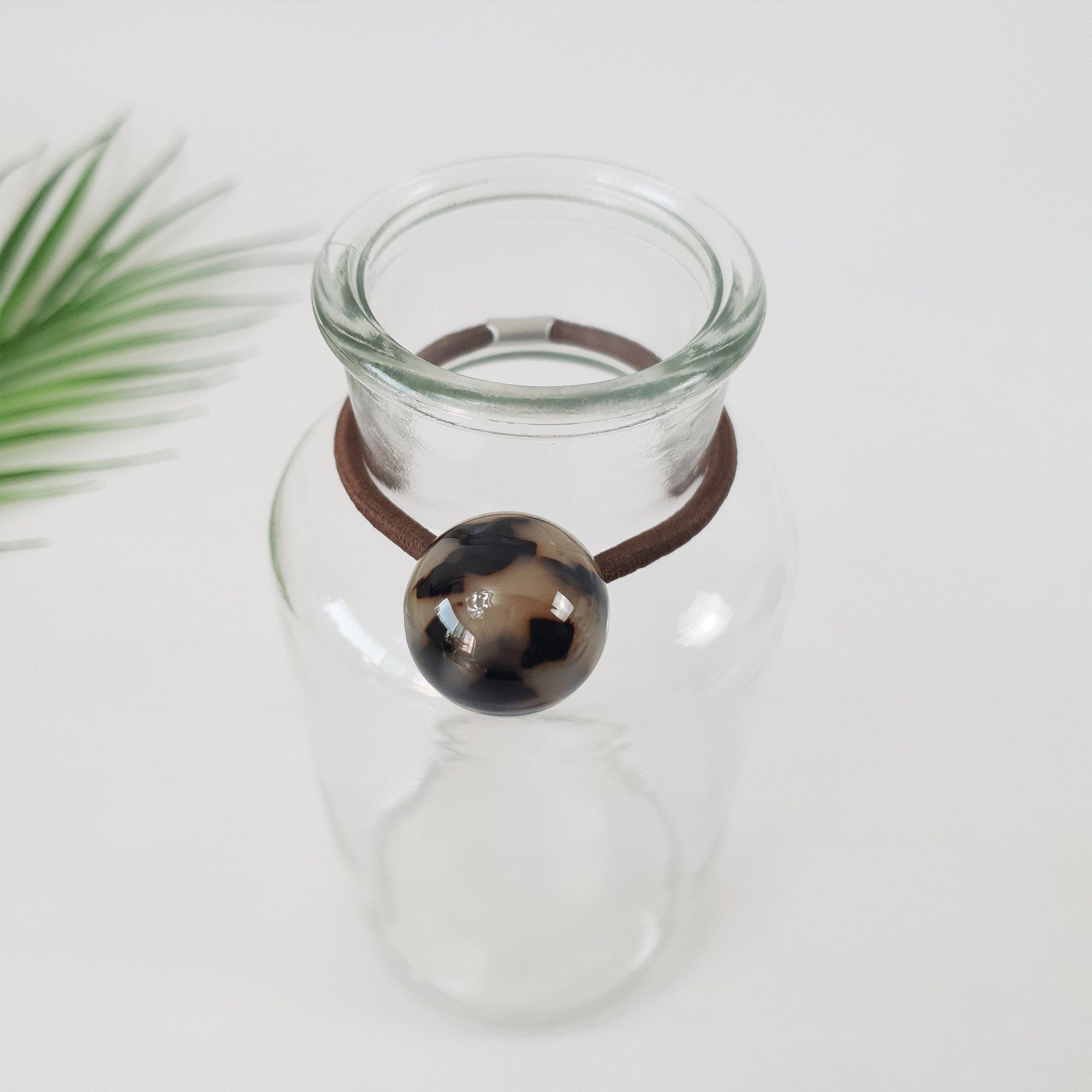 Glossy cellulose acetate hair ties in cube and ball shapes. Geometric ponytail holder in tortoise shell and marble. Minimalist Korean fashion accessory for women birthday gift.