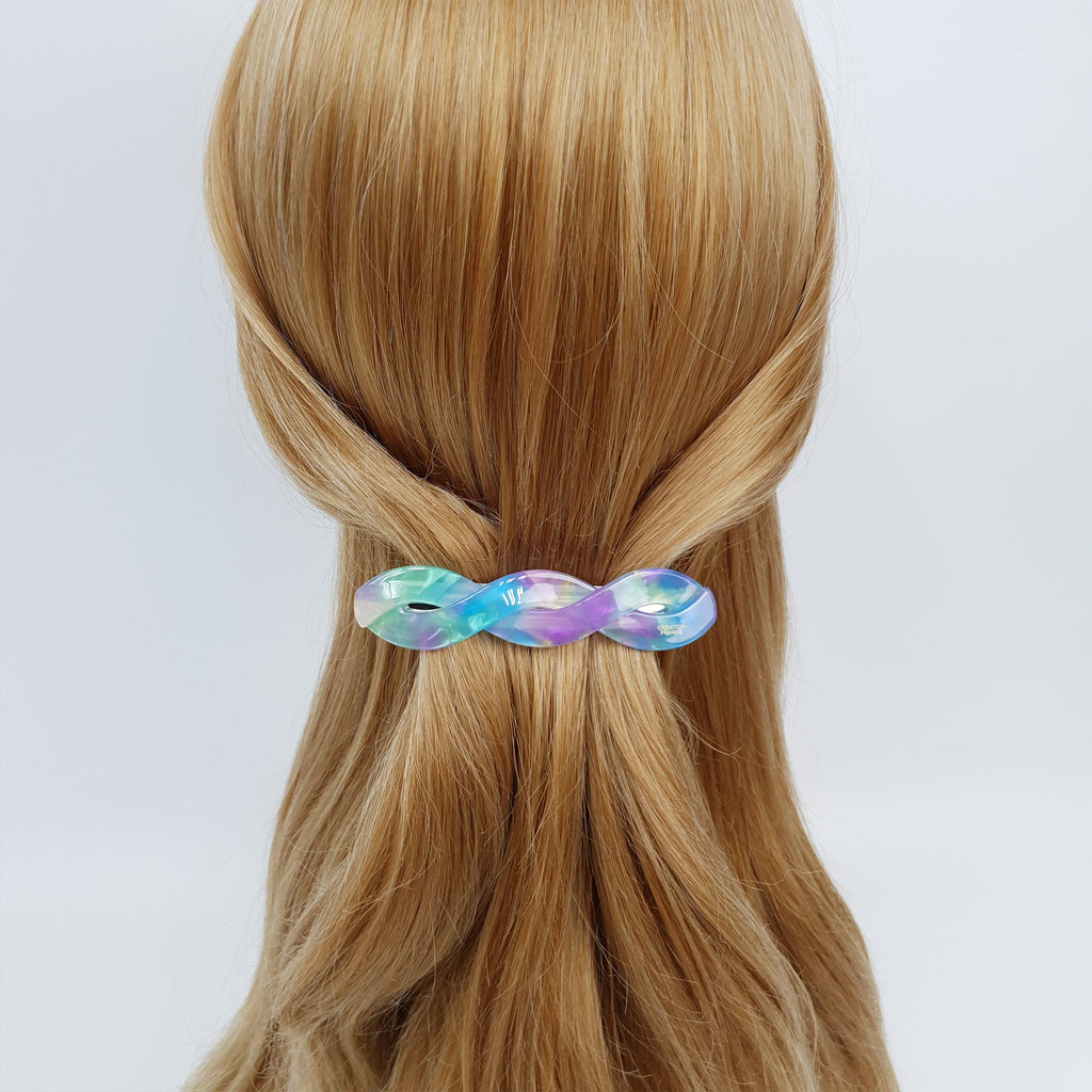Cellulose acetate twisted barrette in tortoise and marble patterns. 3.7 inch automatic clip for half up styles and fine hair.