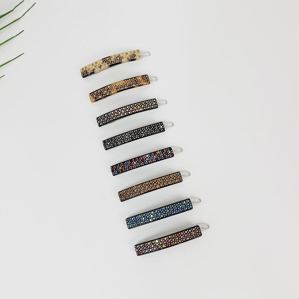 Cellulose acetate rectangular snap hair clip with rhinestone crystals. Small 2 inch barrette for bangs in black and tortoise shell.