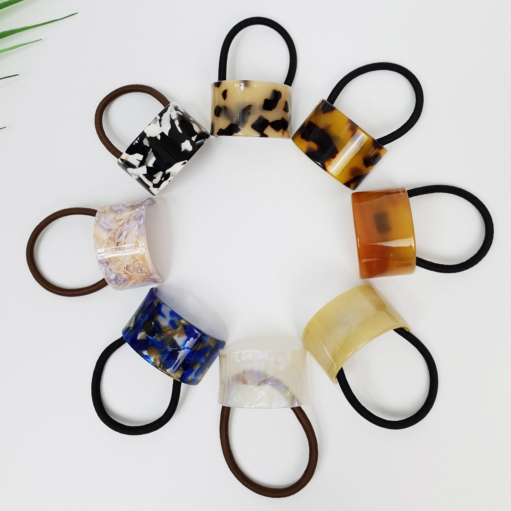 Leopard Curved Square Hair Tie / Cute Ponytail Holder / Hair Accessory for Woman / French Hair Pin / Hair Scrunchy Eight assorted hair scrunchies with different patterns and colors. The scrunchies are made of a hard plastic material and have a glossy finish. The patterns include black and white, brown and white, and blue and white. The colors include brown, white, and black.