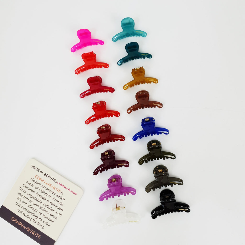 Small cellulose acetate hair claw clip in vibrant solid colors, glossy mini jaw clip for bangs and side hair, cute hair accessory for women and girls.