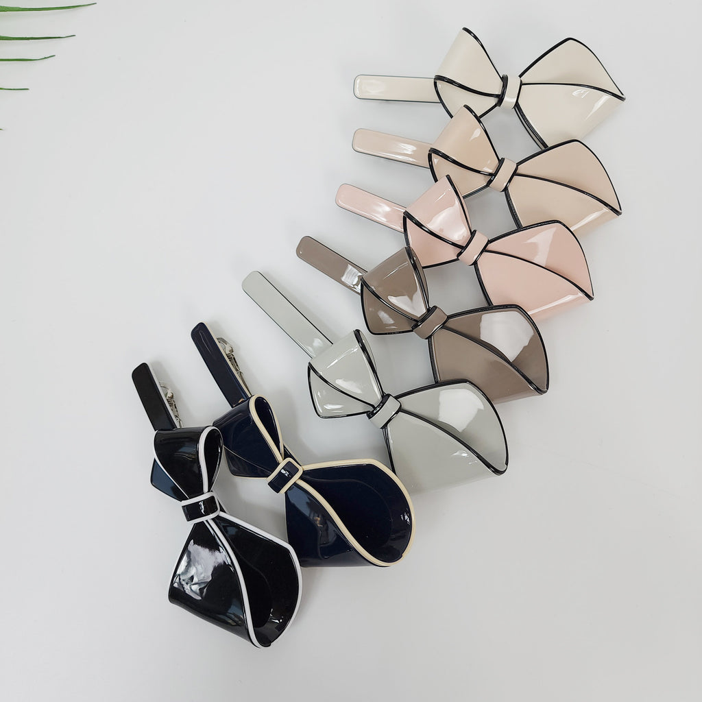 Large pastel cellulose acetate flat bow barrette. 4.0 inch minimalist ribbon hair clip for ponytails. Automatic french clasp accessory for women.