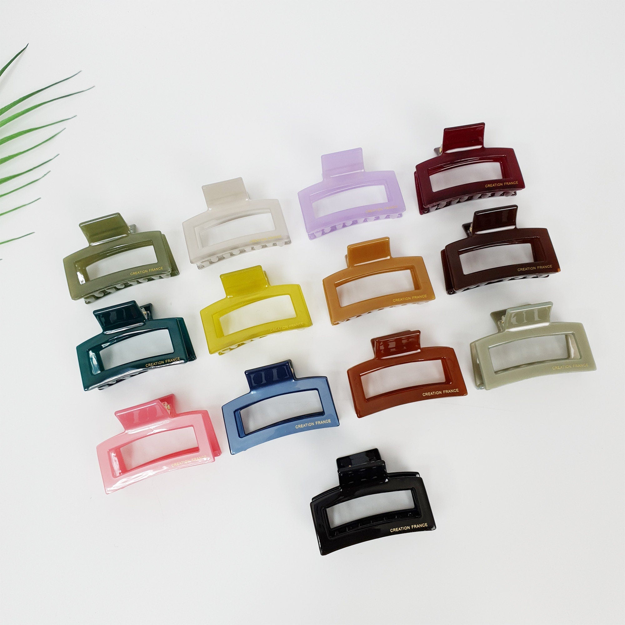 Cellulose acetate square hair claw clip in pink and tortoise shell. 2.2 inch geometric rectangular jaw clamp for half-up hairstyles.