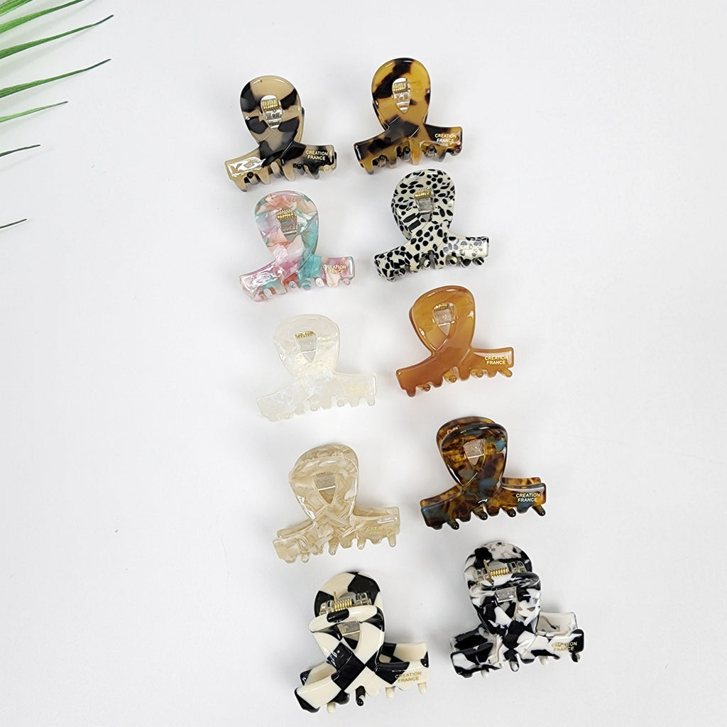 Small cellulose acetate twist hair claw clip. Tortoise shell, checkerboard, and dalmatian mini jaw clamp. 1.6 inch cute loop accessory for half updos and bangs.
