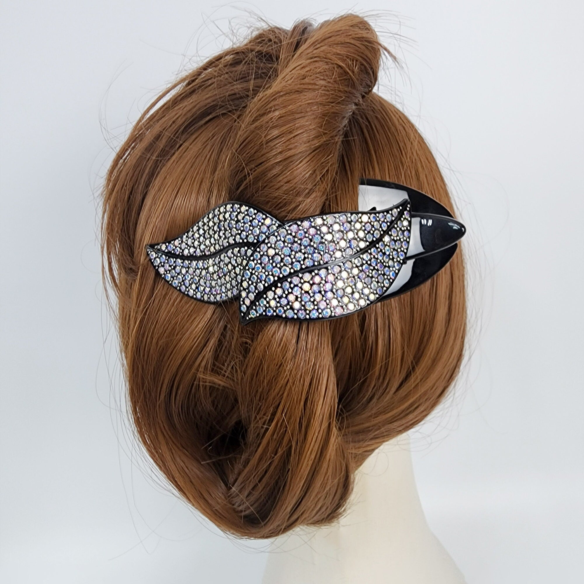 Large black beak clip with sparkling rhinestone leaf design for thick hair updos and elegant evening styles.