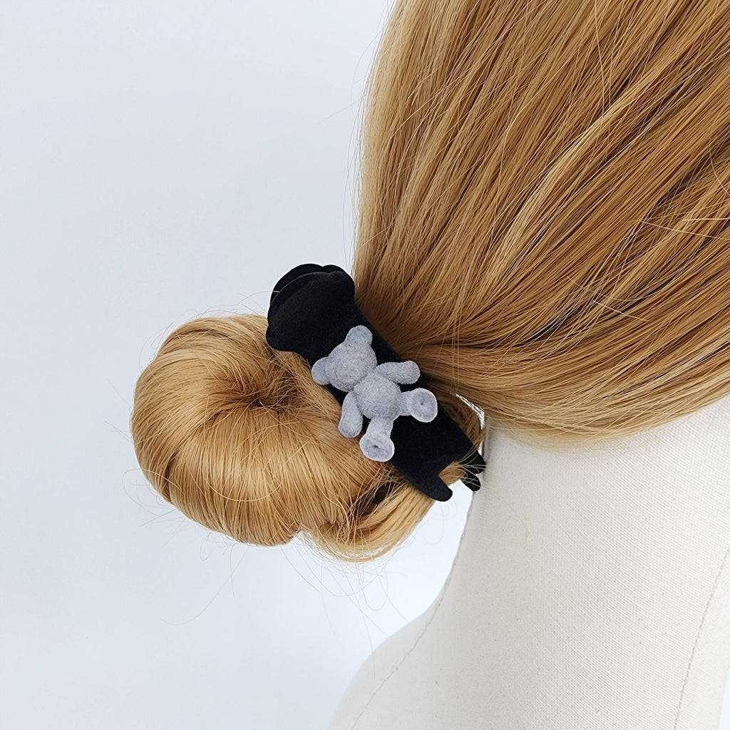 Black velvet circular hair claw with plush teddy bear, cute round bun holder for girls ponytail and winter styling.