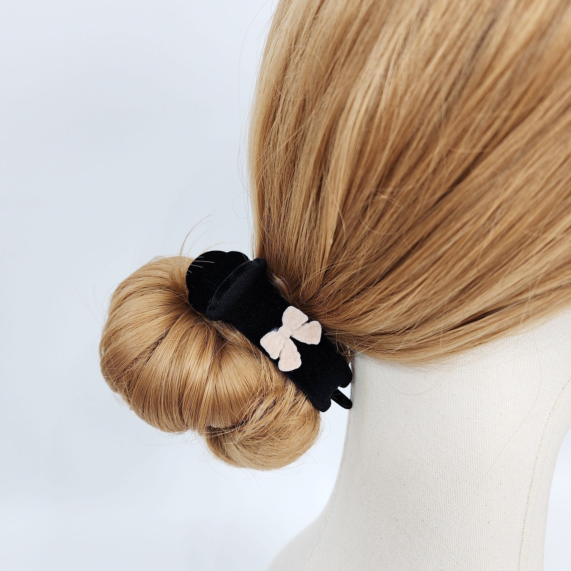 Black velvet round claw clip with petite red bow, 3.1 inch ponytail holder bun cuff for winter and Christmas styling.