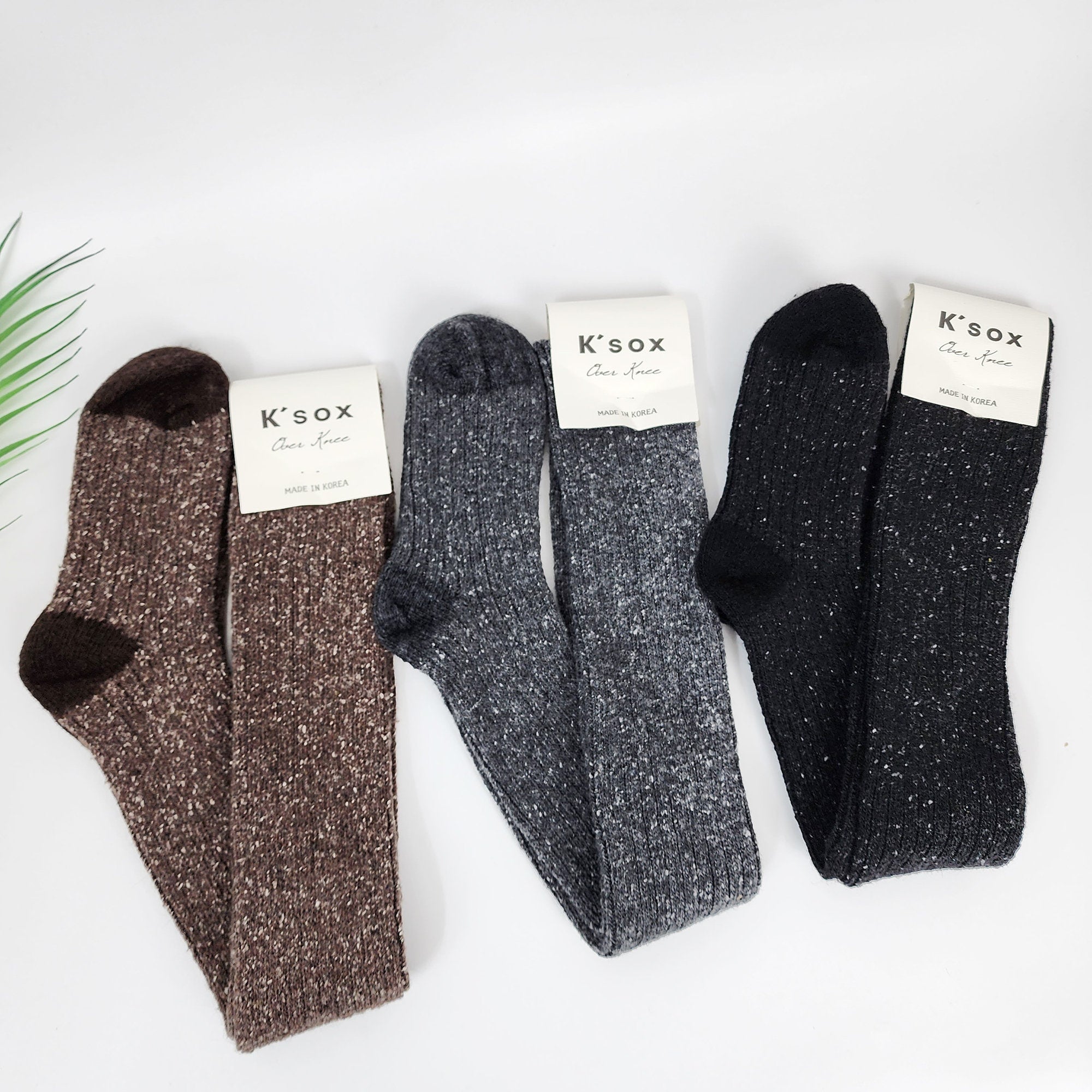 ✨ Marled Wool Blend Thigh Highs
Wrap your legs in warmth with these premium Wool Knit Over-the-Knee Socks. Featuring a classic marled (bokashi) texture and a generous 75cm length, these thermal stockings provide superior coverage and insulation for the coldest winter days. Perfect for layering with boots or wearing as cozy loungewear, they combine Korean fashion sensibility with essential winter comfort.