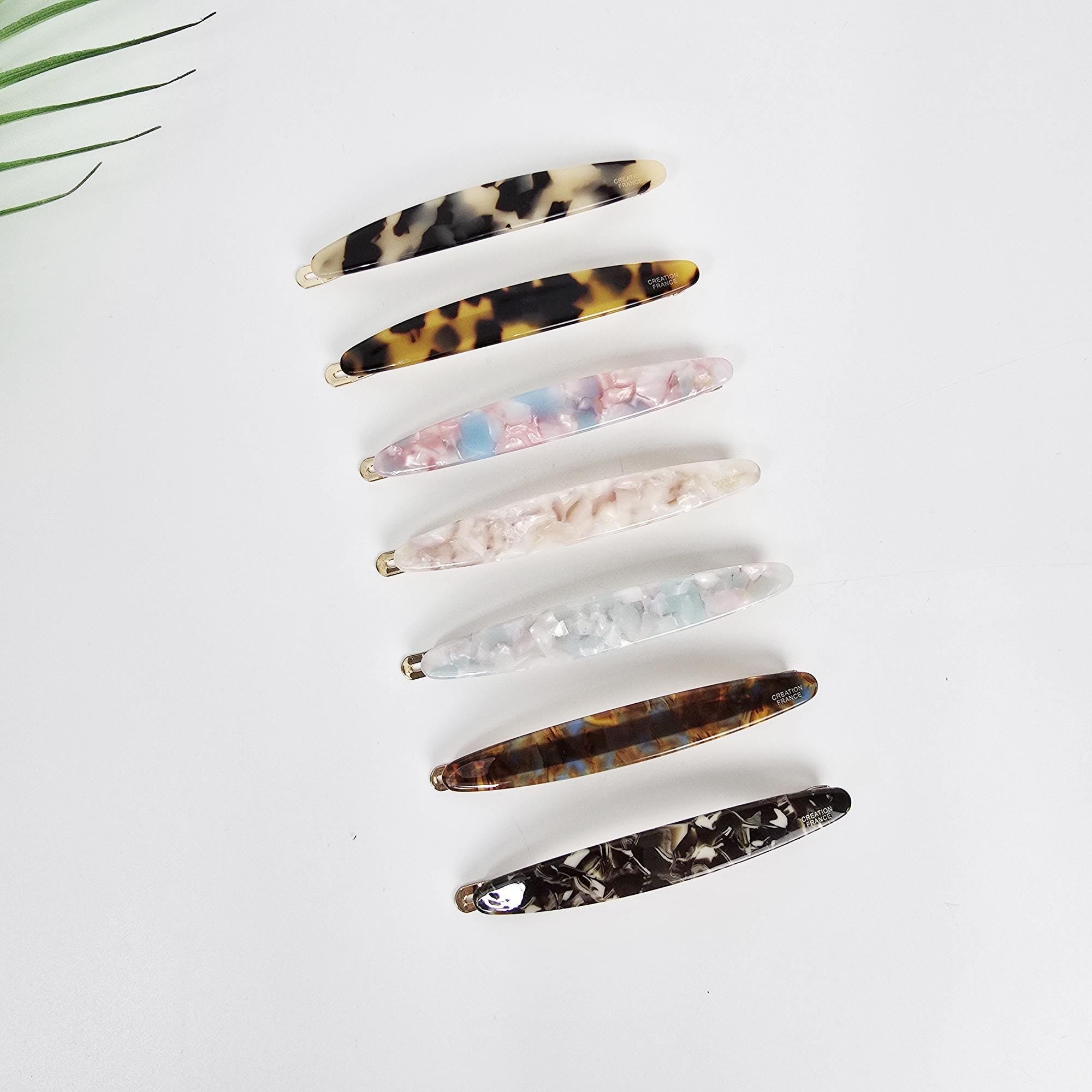 Cellulose acetate hair barrette in tortoise shell and marble patterns. 3.7 inch slim gold clip for side bangs or half updo. Minimalist french style hair accessory for women.