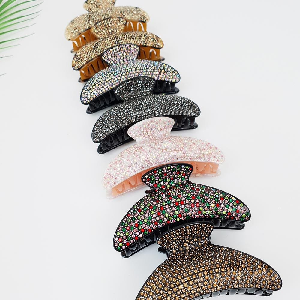 Large rhinestone hair claw clip with double teeth grip for thick hair. Sparkling crystal jaw clip in half moon shape for wedding and party updos.
